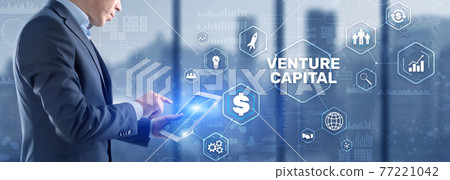 Businessman touching finger Venture Capital. Mixed Media Businessman touching finger Venture Capital. Mixed Media 77221042