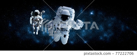 Astronaut spaceman do spacewalk while working for space station 77222706