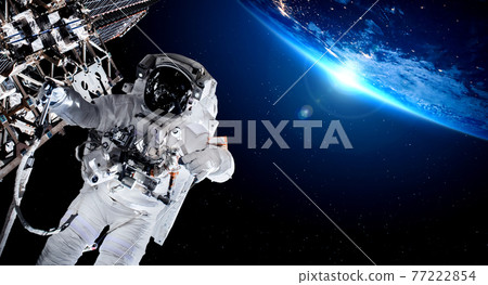 Astronaut spaceman do spacewalk while working for space station 77222854