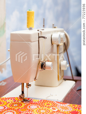 foot sewing machine and fabric closeup foot sewing machine and fabric closeup 77223936