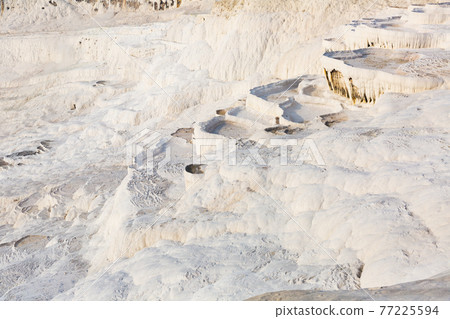 Travertines mountains of Pamukkale in Turkey. Travertines mountains of Pamukkale in Turkey. 77225594