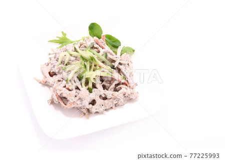 Burdock and lotus root salad bright background 77225993