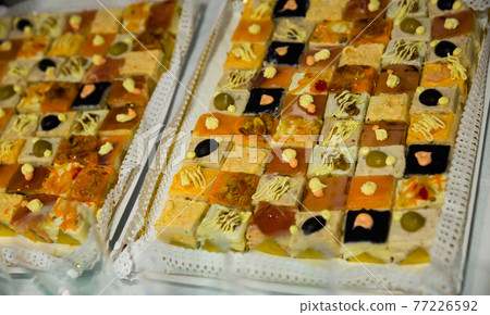 Different fancy cakes on banquet table Different fancy cakes on banquet table 77226592