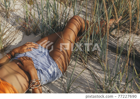 Close-up of Boho Woman on the Beach Close-up of Boho Woman on the Beach 77227690