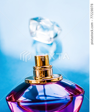Perfume bottle on glossy background, sweet floral scent, glamour fragrance and eau de parfum as holiday gift and luxury beauty cosmetics brand design Perfume bottle on glossy background, sweet floral scent, glamour fragrance and eau de parfum as holiday gift and luxury beauty cosmetics brand design 77228078