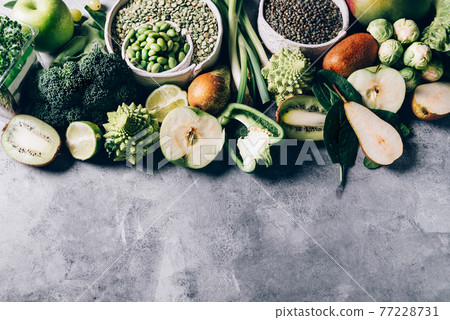 Variety of Green Vegetables and Fruits 77228731