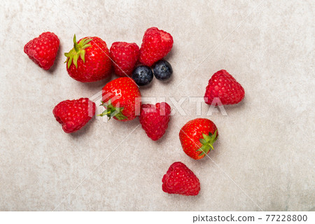 Fresh summer berries such as blueberries, strawberries, raspberries 77228800