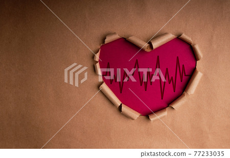 World Health Day. International World Heart Day Concept. Craft Paper as Heart Shape with Beat Rate and Stethoscope inside. Love and Care. Top View 77233035