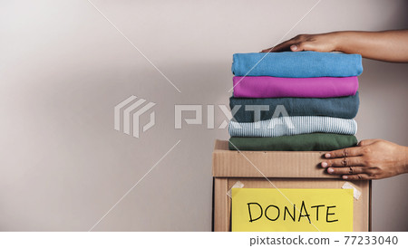 Clothes Donation, Renewable Concept.Box of Use Old Cloth 77233040