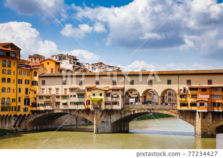 Ponte Vecchio Old Bridge on Arno River and Vasari Corridor Florence Tuscany Italy Ponte Vecchio Old Bridge on Arno River and Vasari Corridor Florence Tuscany Italy 77234427