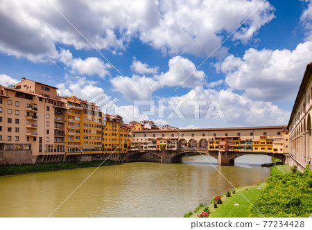 Florence cityscape with Ponte Vecchio Old Bridge over Arno River Tuscany Italy 77234428