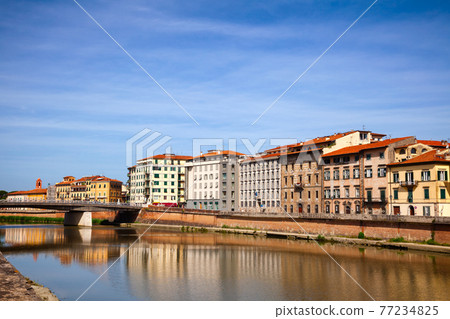 Waterfront buildings on Arno River embankment Pisa Tuscany Italy 77234825