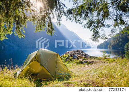 Wild camping by a lake in Norway Wild camping by a lake in Norway 77235174