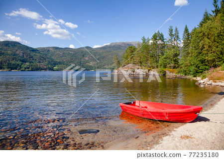 Moored boat at Lake in Norway Moored boat at Lake in Norway 77235180