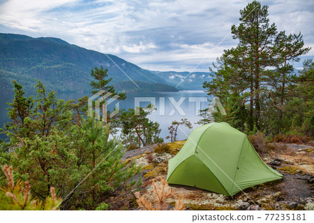 Wild camping by a lake in Norway Wild camping by a lake in Norway 77235181