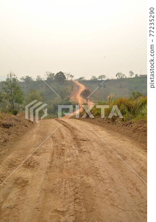 Winding mountain road. Winding mountain road. 77235290
