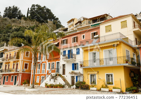 Colorful two-story mansions in Parga town in Epirus, northwestern Greece on the Ionian coast in spring 77236451