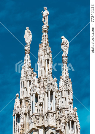 View of magnificent Cathedral of Milano, Milan, Italy, summer time View of magnificent Cathedral of Milano, Milan, Italy, summer time 77243138