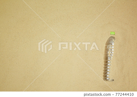 top view a garbage on a sand beach. save th earth concept. top view a garbage on a sand beach. save th earth concept. 77244410