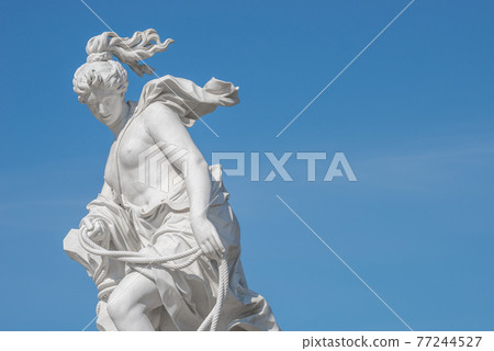 Old statue of a sensual naked Renaissance Era woman in the park of Potsdam, Germany, details, closeup 77244527