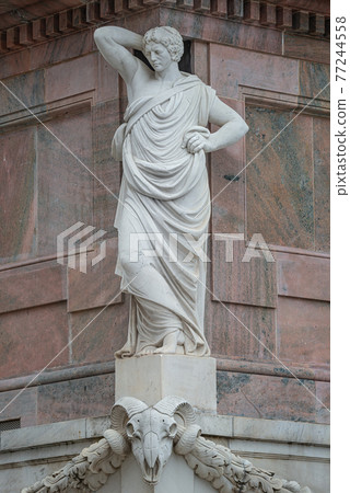 Statue of beautiful Roman noble man at the obelisk in the Old Market square (Alter Markt) in downtown of Potsdam, Germany Statue of beautiful Roman noble man at the obelisk in the Old Market square (Alter Markt) in downtown of Potsdam, Germany 77244558