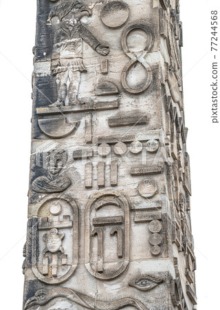 Ancient Egyptian obelisk in the historical downtown of Potsdam isolated at white background, Germany, details Ancient Egyptian obelisk in the historical downtown of Potsdam isolated at white background, Germany, details 77244568