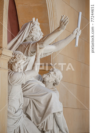 Old statue with prophets in Judaism Moses, Aaron and Hur at the old Church of Peace (Friedenskirche), located at Sanssouci City Park entrance in Potsdam, Germany Old statue with prophets in Judaism Moses, Aaron and Hur at the old Church of Peace (Friedenskirche), located at Sanssouci City Park entrance in Potsdam, Germany 77244651