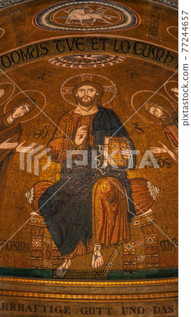 Ancient Biblical scene with Jesus Christ in dome ceiling at the old church called in German Friedenskirche, located at Sanssouci City Park entrance in Potsdam, Germany. Ancient Biblical scene with Jesus Christ in dome ceiling at the old church called in German Friedenskirche, located at Sanssouci City Park entrance in Potsdam, Germany. 77244657