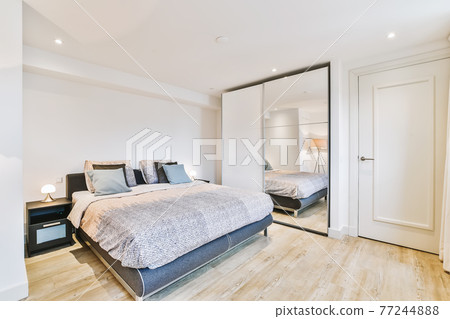 Spacious light bedroom at home Spacious light bedroom at home 77244888