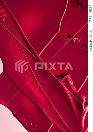 Red lipstick or lip gloss texture as cosmetic background, makeup and beauty cosmetics product for luxury brand, holiday flatlay backdrop or abstract wall art and paint strokes 77244985