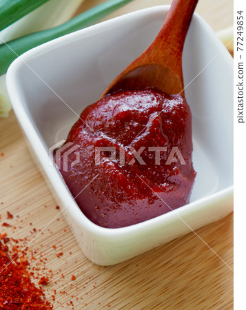 Traditional Korean sauce gochujang and vegetables Traditional Korean sauce gochujang and vegetables 77249854