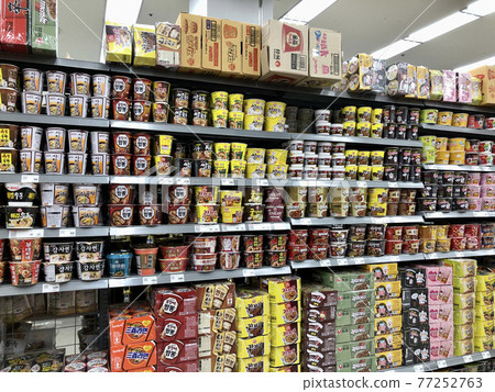 Cup ramen lined up on product shelves in Korean supermarkets 77252763