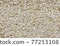Scattered raw oatmeal 77253108
