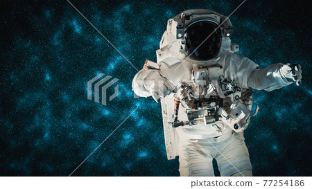 Astronaut spaceman do spacewalk while working for space station 77254186