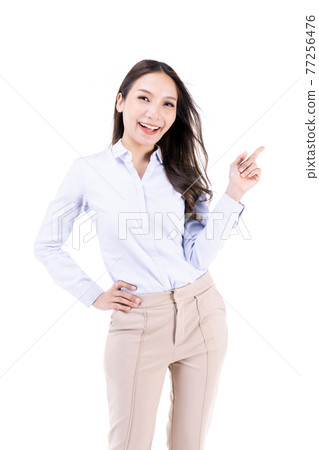 Asian young long hair successful beautiful female businesswoman hold hands up use index finger point and look up smiling to sky in front on white background. Asian young long hair successful beautiful female businesswoman hold hands up use index finger point and look up smiling to sky in front on white background. 77256476