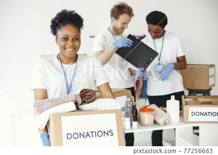 African girl with a box donatation African girl with a box donatation 77256683