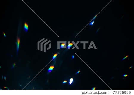 colorful warm rainbow crystal light leaks on black background 77256999