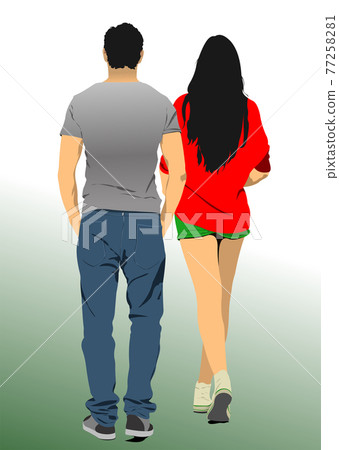 A couple of young people walking on the road. A couple of young people walking on the road. 77258281