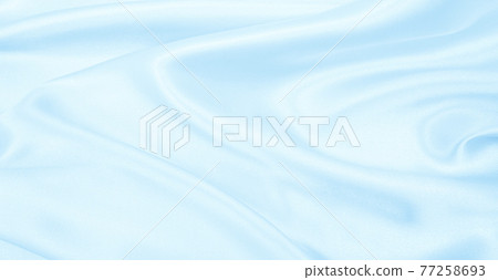 Smooth elegant blue silk or satin luxury cloth texture as abstract background. Luxurious background design 77258693