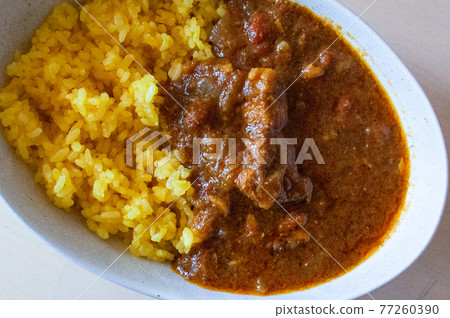 Simply presented pork vindaloo Simply presented pork vindaloo 77260390