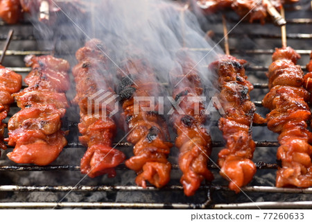 Roast chicken street food in thailand. 77260633