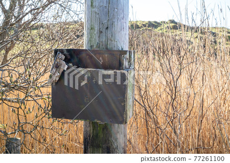 Black box at Utility Pole for transmission of electricity and communication to dwellings in rural Ireland Black box at Utility Pole for transmission of electricity and communication to dwellings in rural Ireland 77261100
