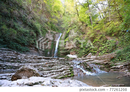 Waterfall "Maiden's braid" in the Adygea Republic, Russia Waterfall "Maiden's braid" in the Adygea Republic, Russia 77261208