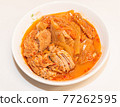 Photographing a Korean dish of pork kimchi stew on a plate. Photographing a Korean dish of pork kimchi stew on a plate. 77262595