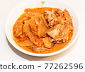 Photographing a Korean dish of pork kimchi stew on a plate. Photographing a Korean dish of pork kimchi stew on a plate. 77262596