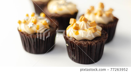 Salted caramel cupcakes, tempting little chocolate cupcakes with a baileys flavour frosting and caramel drizzle 77263952