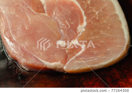 Smoked gammon steak formed from selected cuts of cured pork leg Smoked gammon steak formed from selected cuts of cured pork leg 77264308