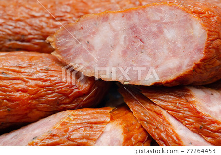 Traditional Polish sausage cut into slices, typical delicatessen product from Eastern Europe 77264453