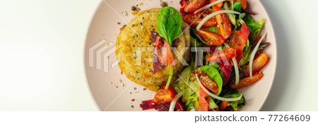 Smoked haddock fishcake with melting cheddar sauce and mixed salad 77264609