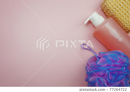 Shower accessories bath items on pink background Shower accessories bath items on pink background 77264722